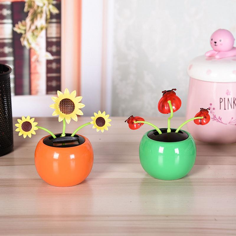 ソーラーパワーダンシングフラワーヒマワリソーラーオーナメント - Home Decor Za のレビューと価格